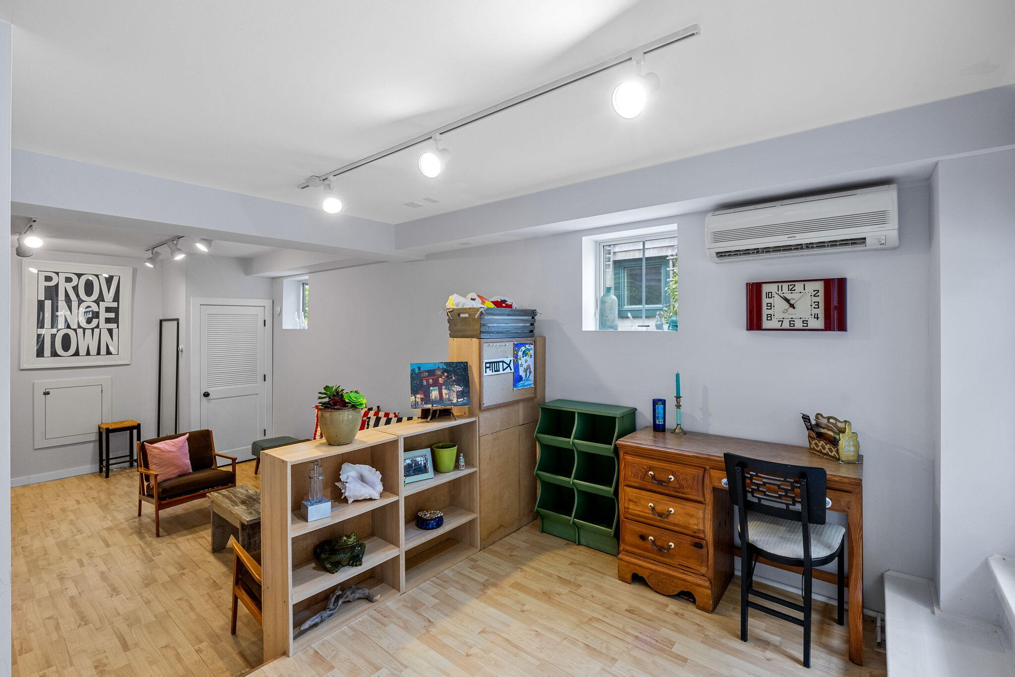 3 Meadow Road, Unit 2 Provincetown, MA 02657 - Photo 22 of 26 a bedroom with furniture a desk and wooden floor