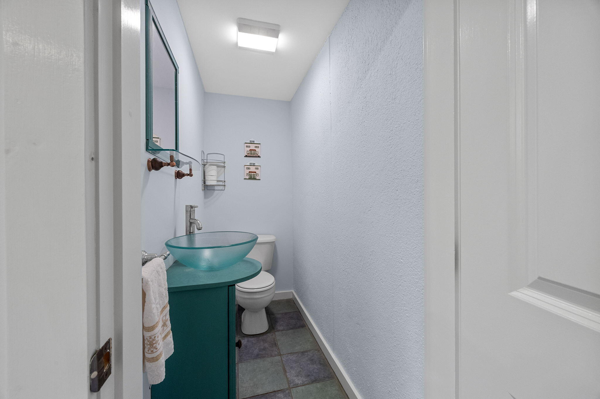 3 Meadow Road, Unit 2 Provincetown, MA 02657 - Photo 24 of 26 a bathroom with a toilet and a mirror