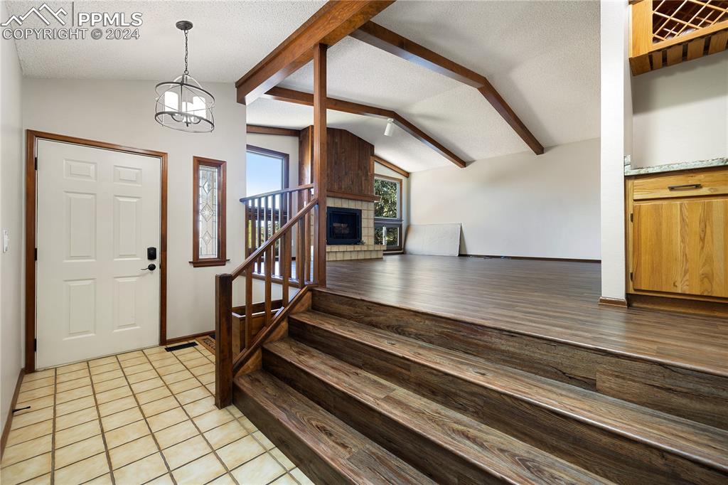 1125 Garlock Lane Colorado Springs, CO 80918 - Photo 19 of 49 a view of entryway and hall with wooden floor