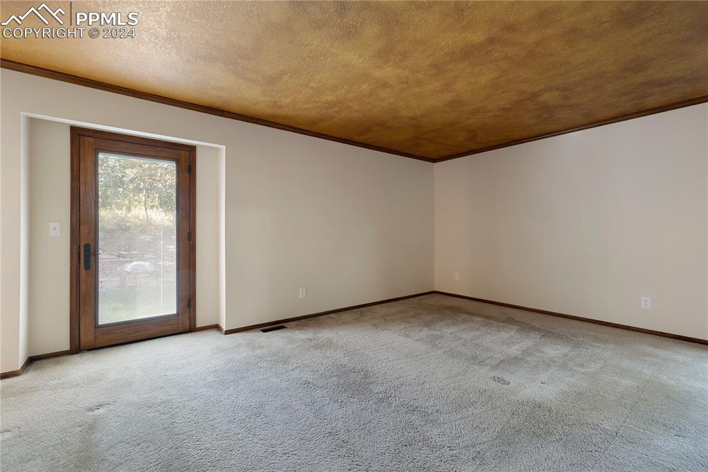 1125 Garlock Lane Colorado Springs, CO 80918 - Photo 26 of 49 a view of an empty room