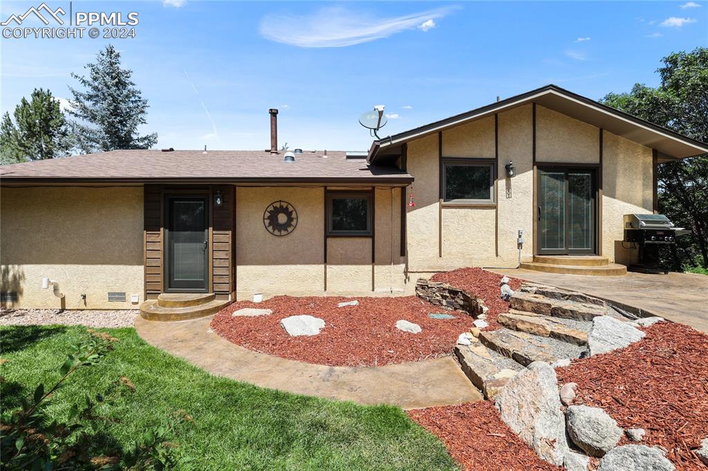 1125 Garlock Lane Colorado Springs, CO 80918 - Photo 40 of 49 a view of a house with kitchen