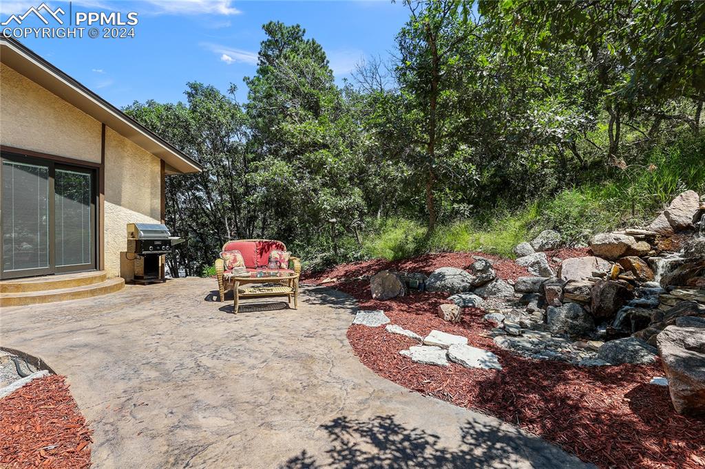1125 Garlock Lane Colorado Springs, CO 80918 - Photo 42 of 49 a car parked in front of a house