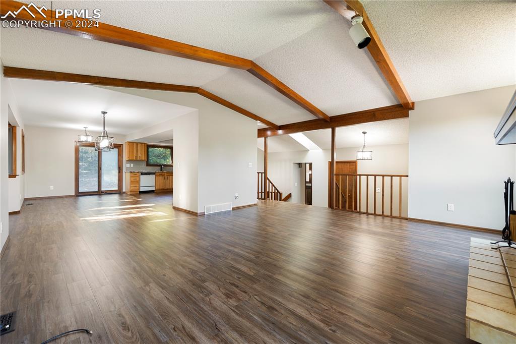 1125 Garlock Lane Colorado Springs, CO 80918 - Photo 10 of 49 a view of a livingroom with wooden floor