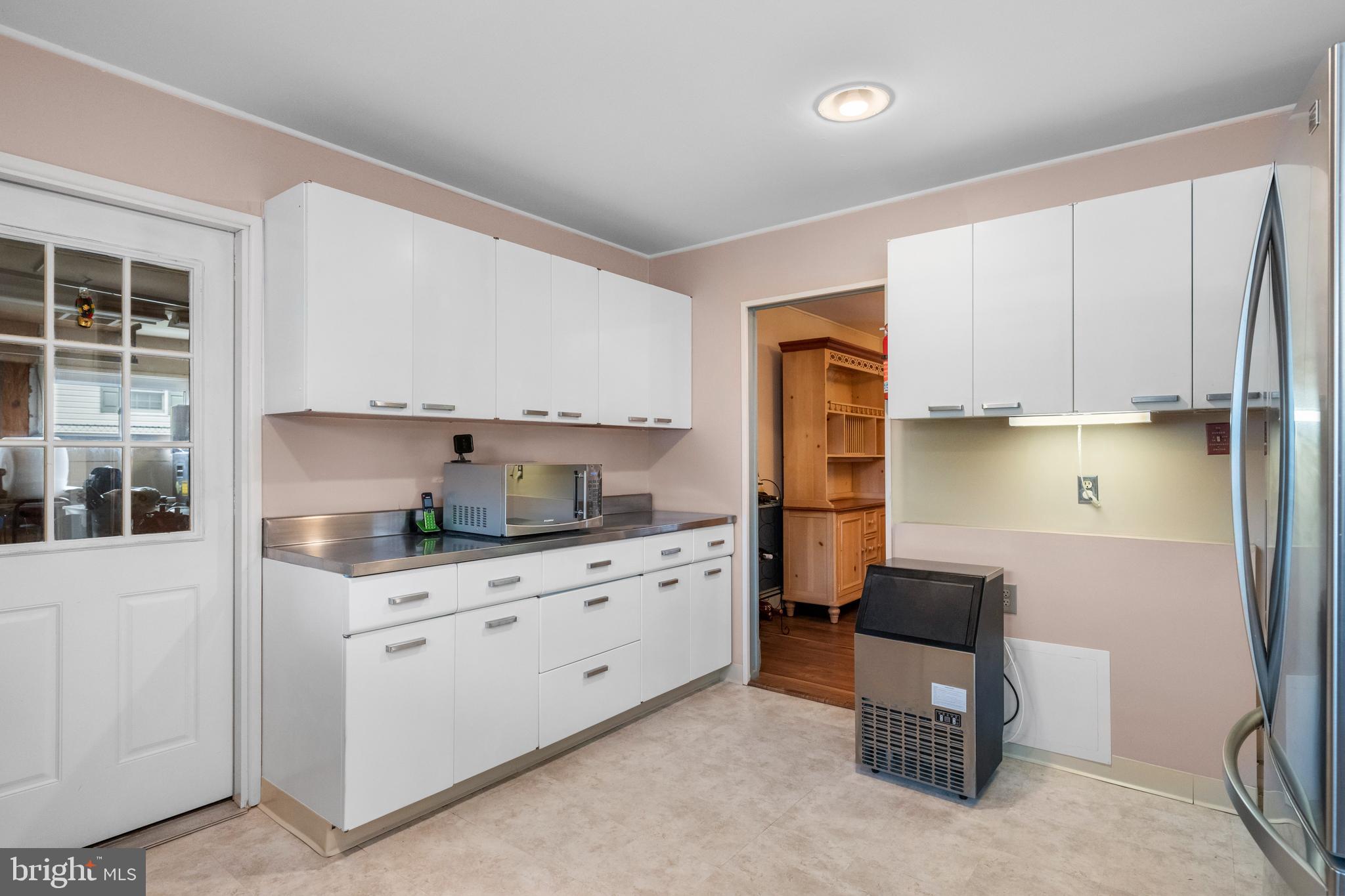 10 Sugarplum Road Levittown, PA 19056 - Photo 24 of 38 Freshly Painted kitchen cabinets