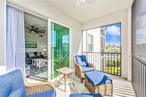 a bathroom with a toilet sink vanity and mirror
