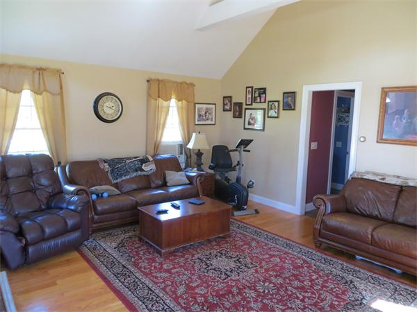 16 Winifreds Way Rutland, MA 01543 - Photo 9 of 22 a living room with furniture rug and window