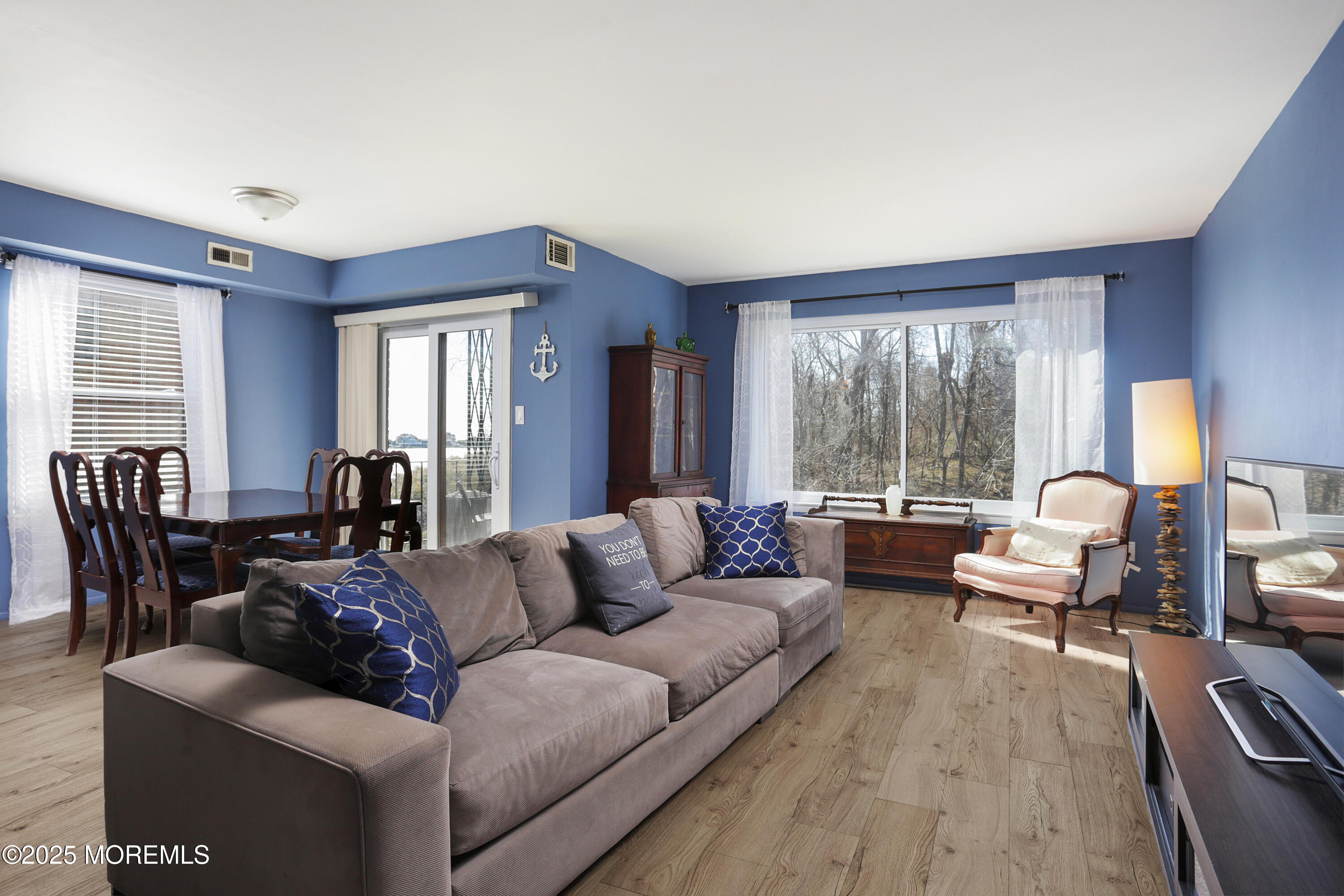 200 Portland Road, Unit C2 Highlands, NJ 07732 - Photo 1 of 20 a living room with furniture and large windows