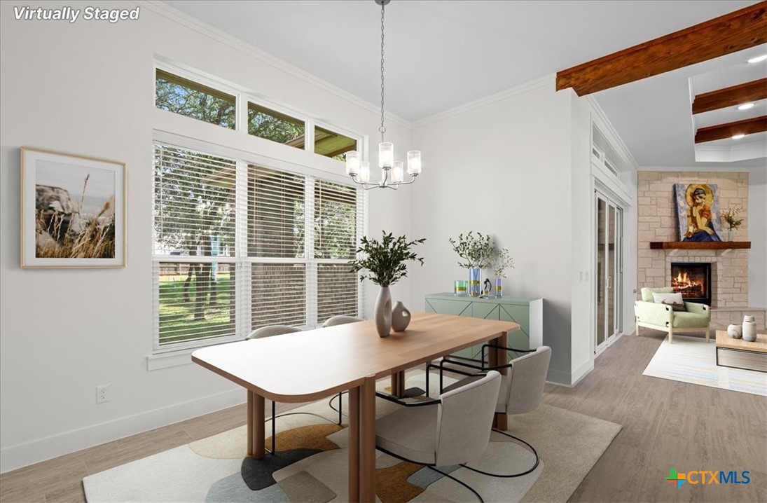 8439 Spring Creek Loop Salado, TX 76571 - Photo 11 of 40 Virtually staged dining