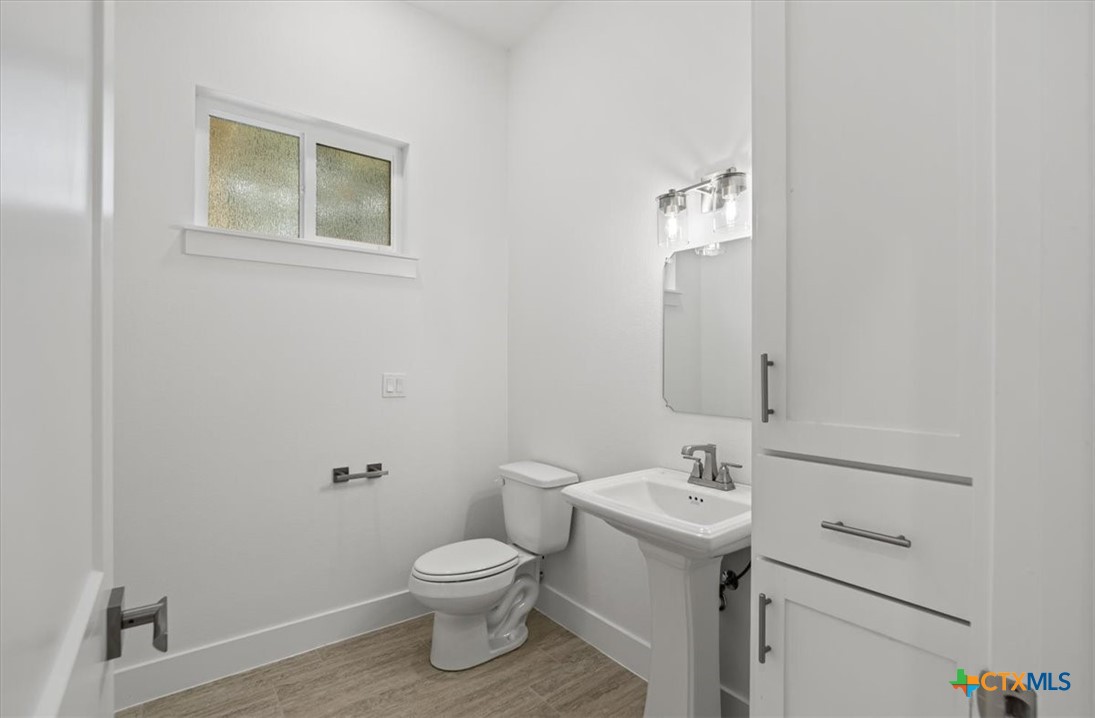 8439 Spring Creek Loop Salado, TX 76571 - Photo 17 of 40 Half Bath near kitchen