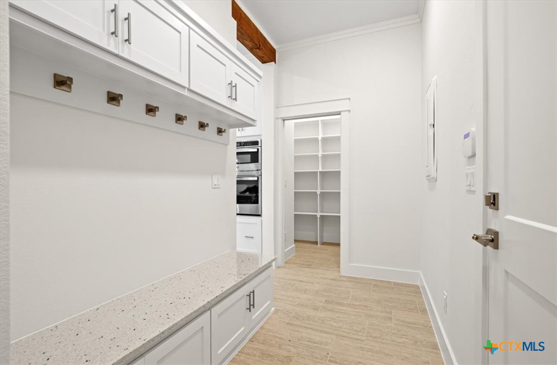 8439 Spring Creek Loop Salado, TX 76571 - Photo 18 of 40 Drop Zone are to Large walk-in pantry