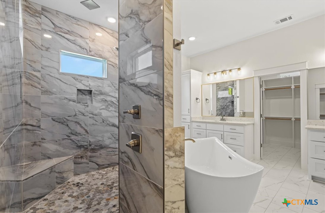8439 Spring Creek Loop Salado, TX 76571 - Photo 21 of 40 Walk through shower with 2 heads and rainshower