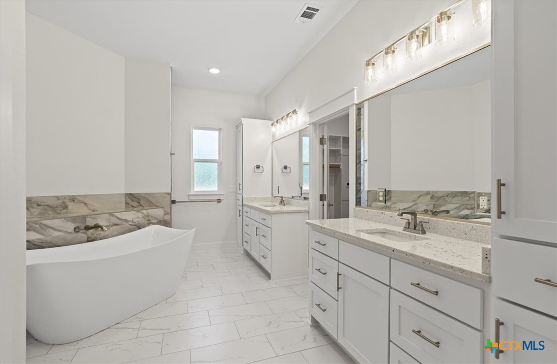 8439 Spring Creek Loop Salado, TX 76571 - Photo 23 of 40 Split Vanities with sinks and extra storage