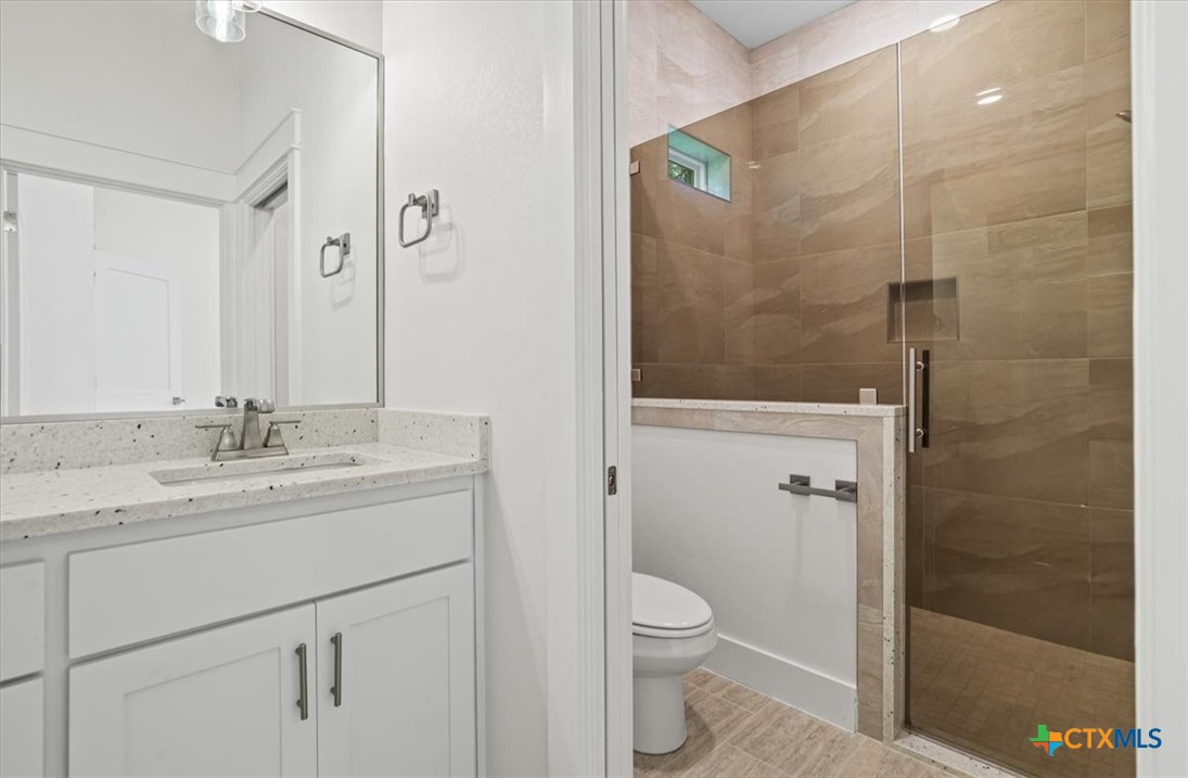 8439 Spring Creek Loop Salado, TX 76571 - Photo 32 of 40 Full Bath 3 with walkin shower and seamless glass.