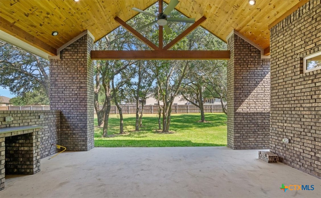 8439 Spring Creek Loop Salado, TX 76571 - Photo 5 of 40 Vaulted outdoor patio with wood accents
