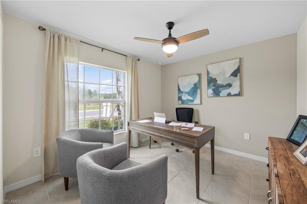 12265 Savanna Lakes Boulevard Lehigh Acres, FL 33936 - Photo 13 of 31 Home office with ceiling fan and light tile patterned floors