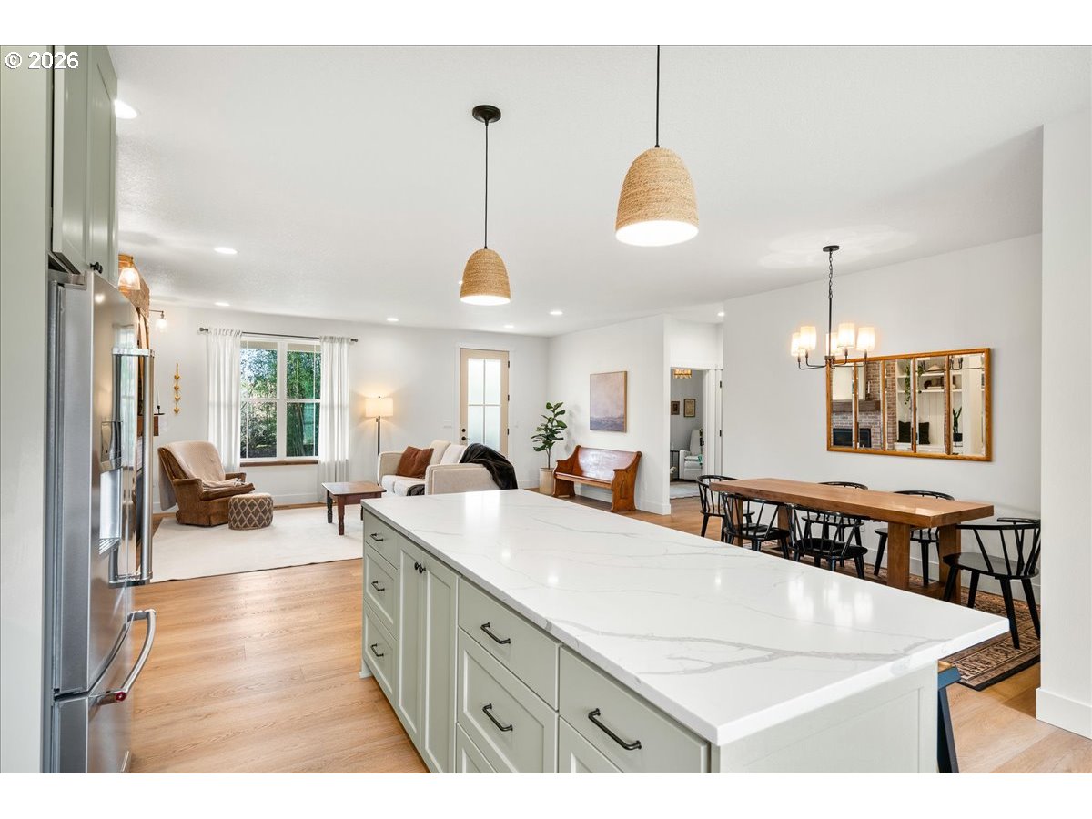 1305 Uff Da Street Silverton, OR 97381 - Photo 20 of 46 a view of a kitchen center island and living room