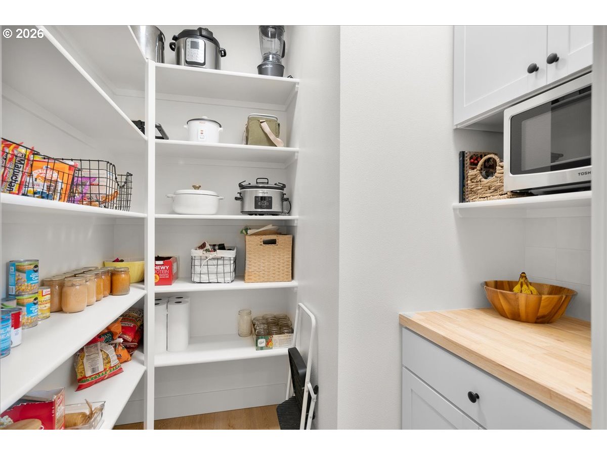 1305 Uff Da Street Silverton, OR 97381 - Photo 21 of 46 a kitchen with a fridge and a sink