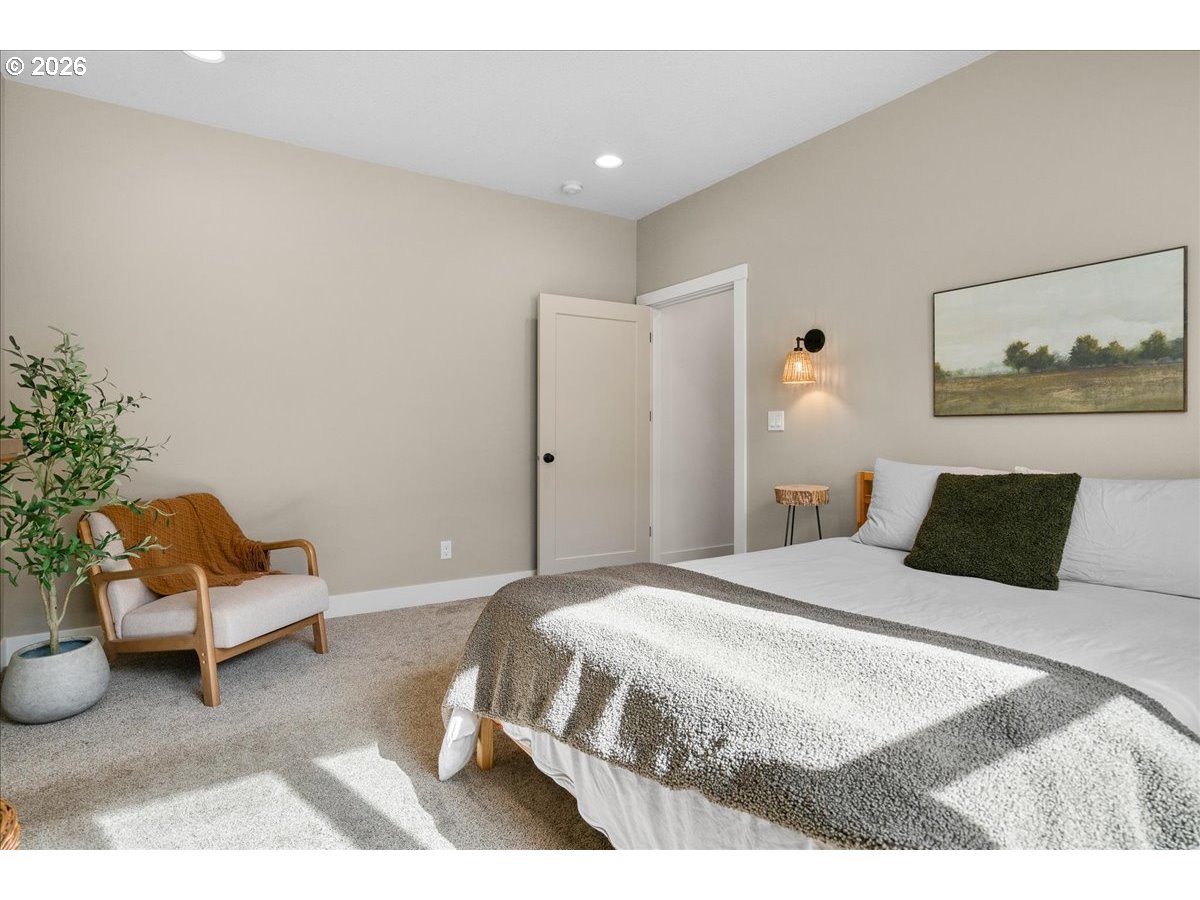 1305 Uff Da Street Silverton, OR 97381 - Photo 23 of 46 a bedroom with a bed and a couch