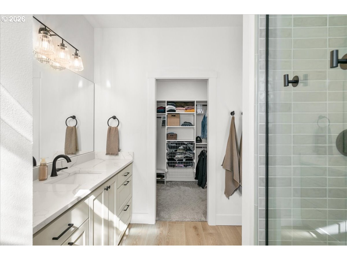 1305 Uff Da Street Silverton, OR 97381 - Photo 28 of 46 a bathroom with a sink and mirror