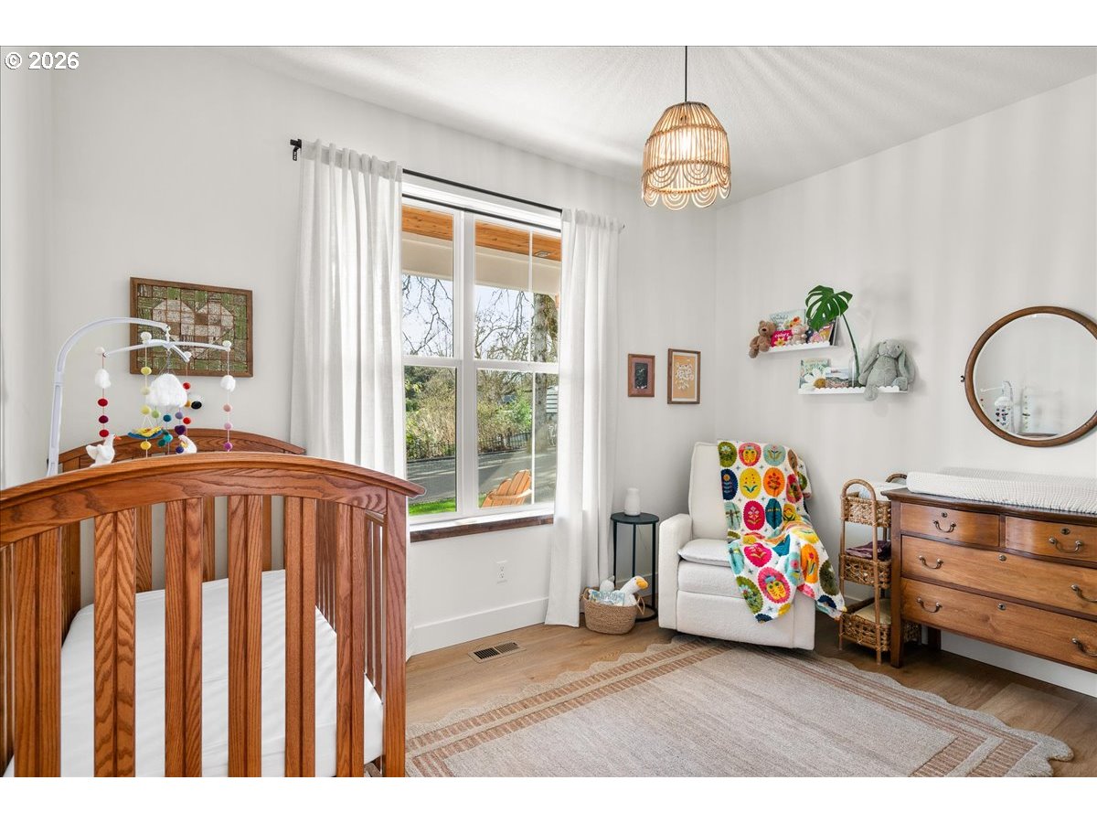 1305 Uff Da Street Silverton, OR 97381 - Photo 29 of 46 a bedroom with a bed and a window