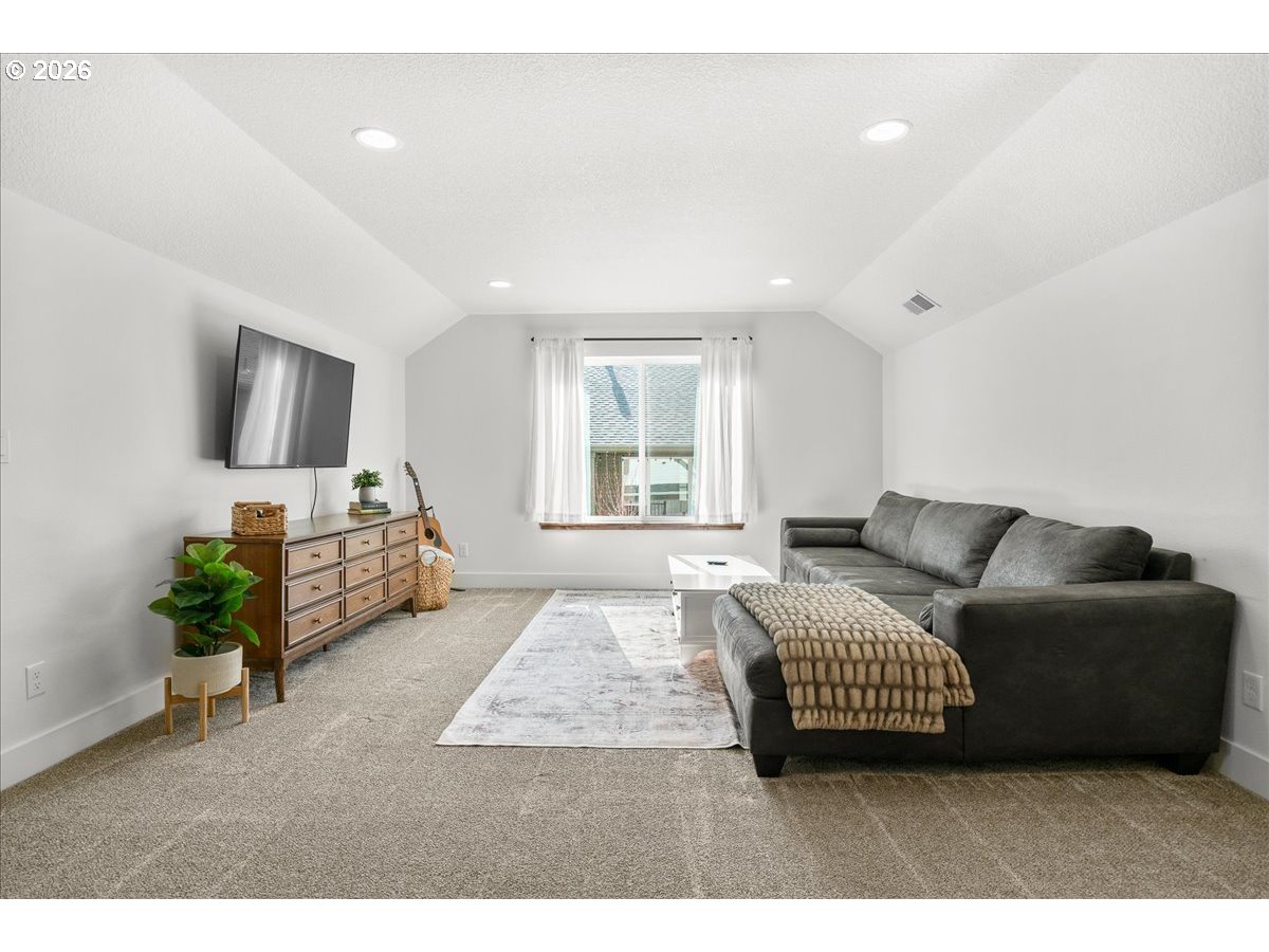 1305 Uff Da Street Silverton, OR 97381 - Photo 37 of 46 a living room with furniture and a flat screen tv