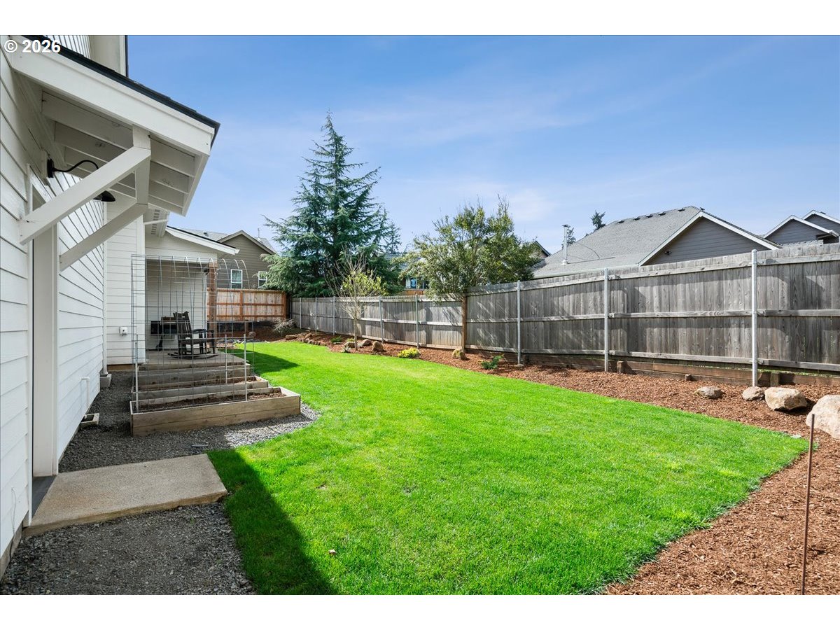 1305 Uff Da Street Silverton, OR 97381 - Photo 44 of 46 a view of a house with a yard porch and sitting area