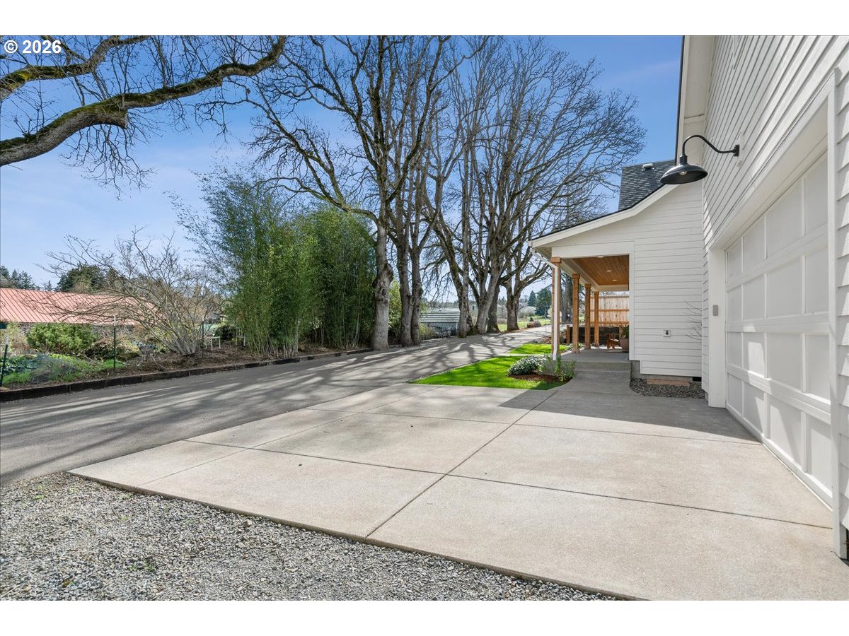 1305 Uff Da Street Silverton, OR 97381 - Photo 46 of 46 a view of a backyard with large trees