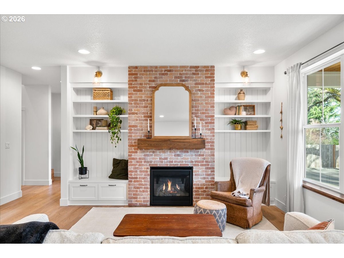 1305 Uff Da Street Silverton, OR 97381 - Photo 6 of 46 a living room with furniture and a fireplace