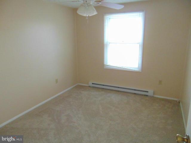 3623 Carrollton Road Upperco, MD 21155 - Photo 16 of 20 an empty room with a window