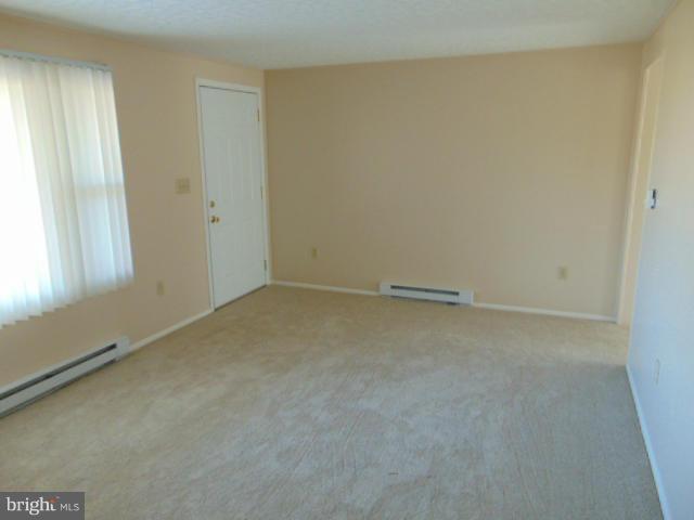 3623 Carrollton Road Upperco, MD 21155 - Photo 8 of 20 an empty room with a window