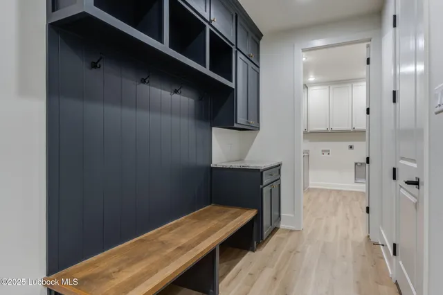 a bedroom with a bed and ceiling fan