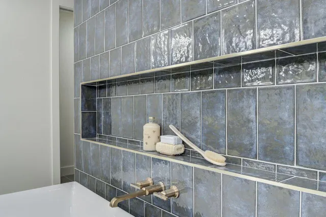 a dining hall with granite countertop a sink and cabinets