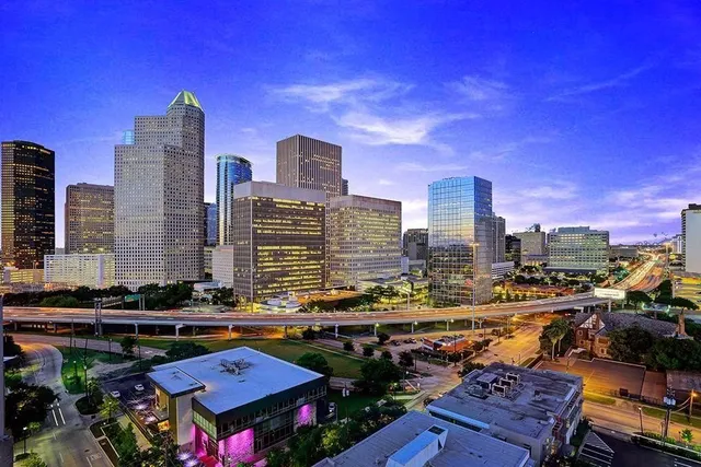 a city view with tall buildings