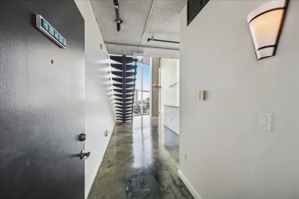 a view of hallway with stairs