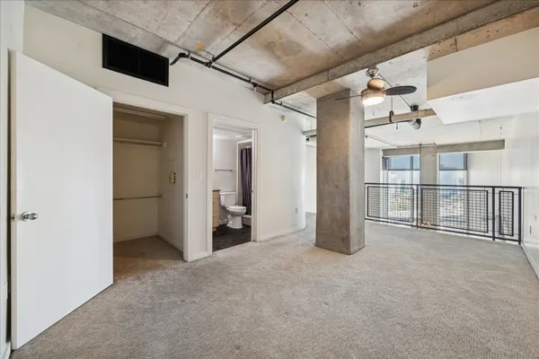 a view of a room with racks on the wall