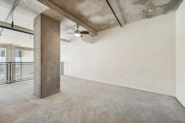 a bathroom with a sink a toilet a mirror and shower