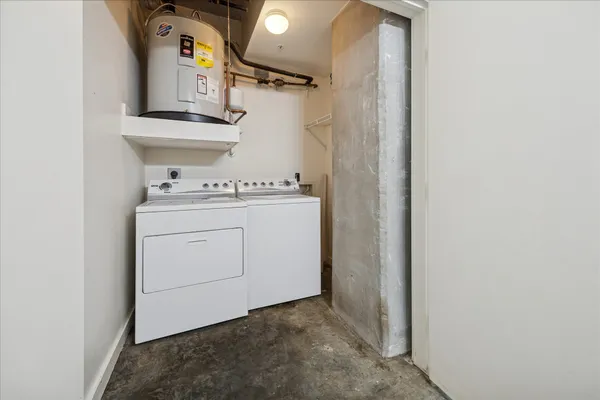 a view of a livingroom with furniture and window