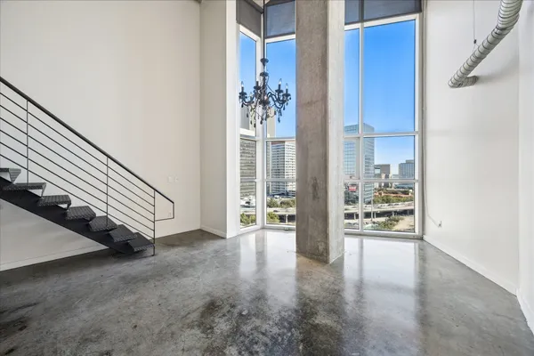 a view of a room with a large window