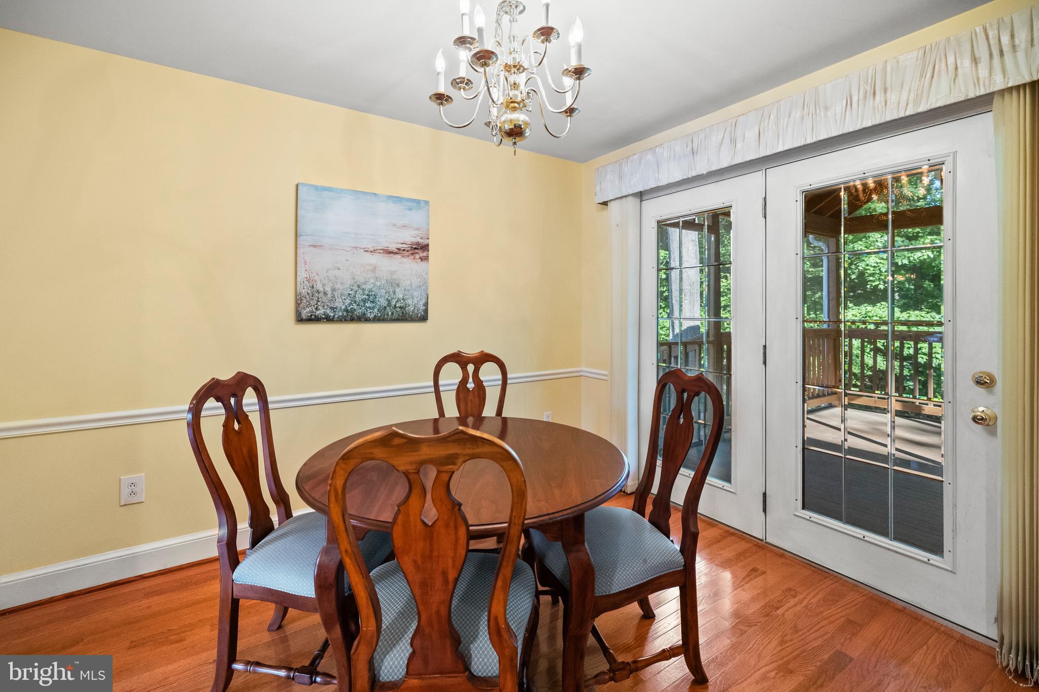 7933 St George Court Springfield, VA 22153 - Photo 14 of 40 Dining room w/ access to screened in porch