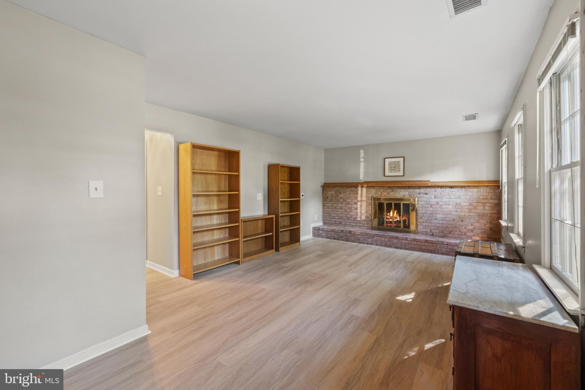 7933 St George Court Springfield, VA 22153 - Photo 20 of 40 Expansive family room w/ cozy fireplace