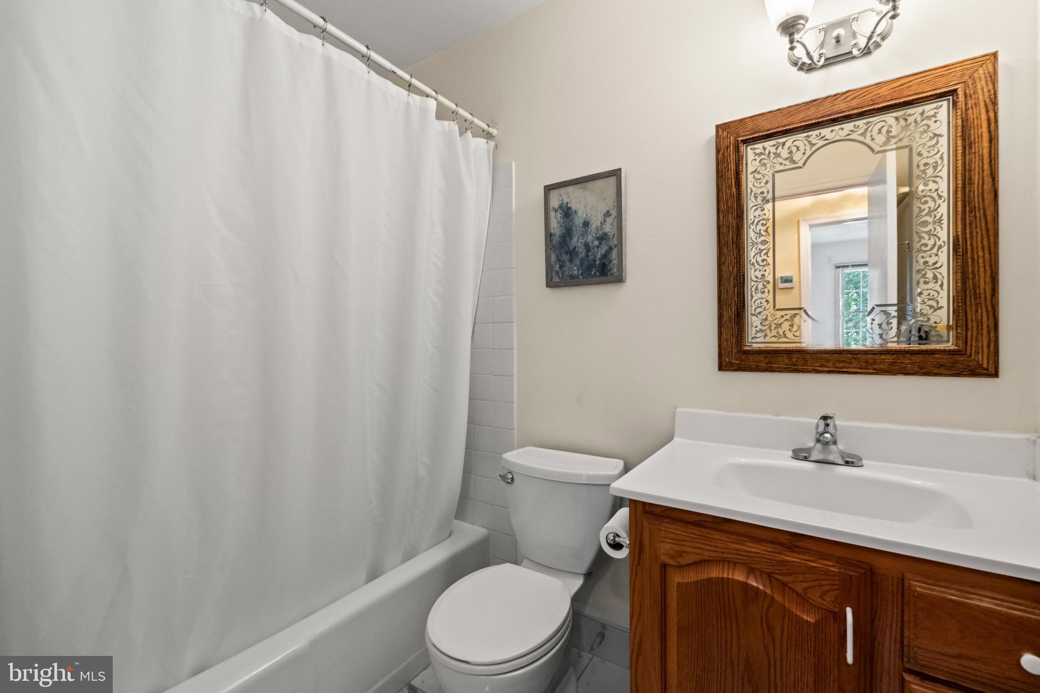 7933 St George Court Springfield, VA 22153 - Photo 31 of 40 BRAND new tile flooring in hallway bathroom!