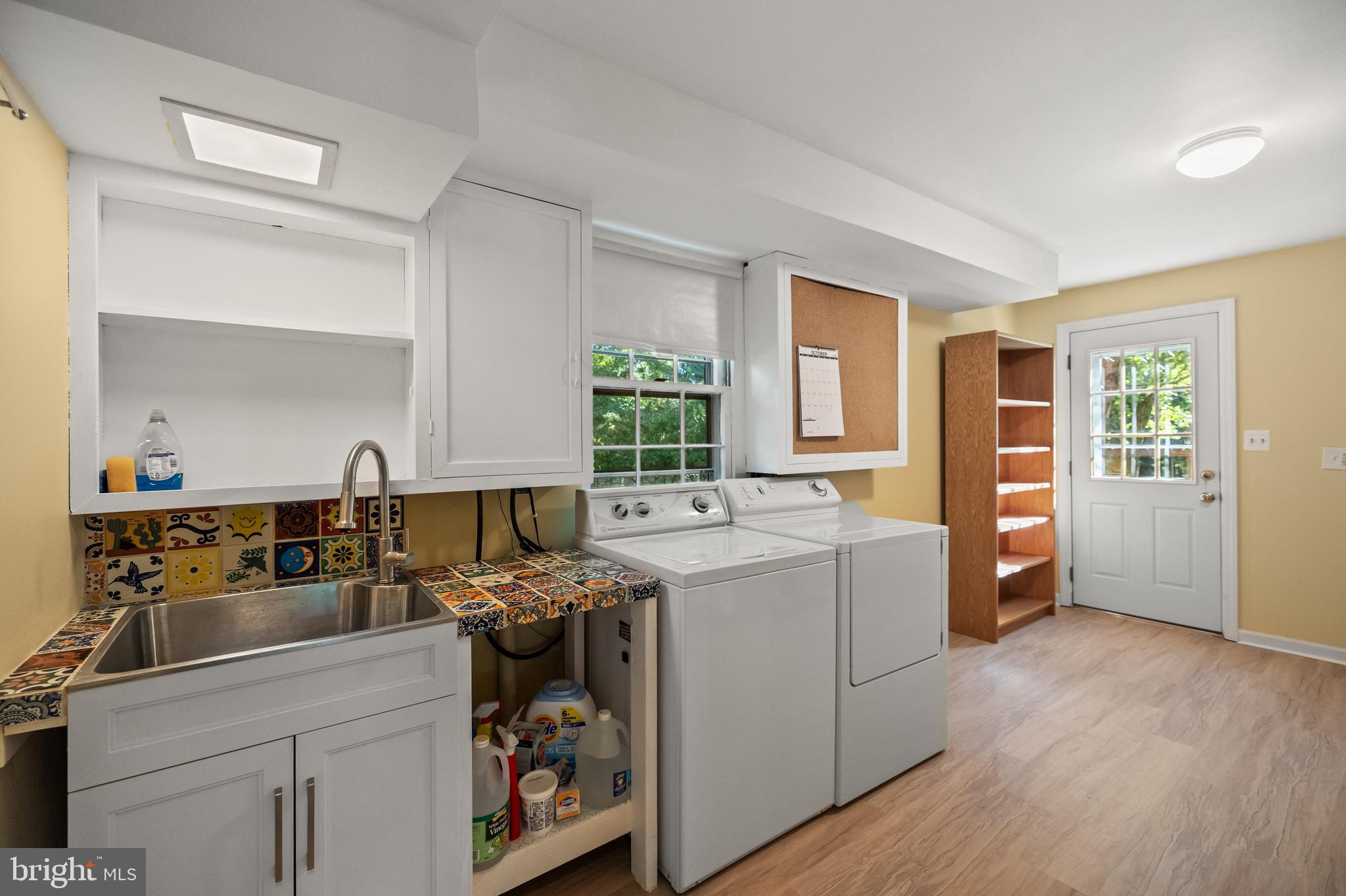 7933 St George Court Springfield, VA 22153 - Photo 34 of 40 HUGE sunlit laundry room w/ walkout to yard!