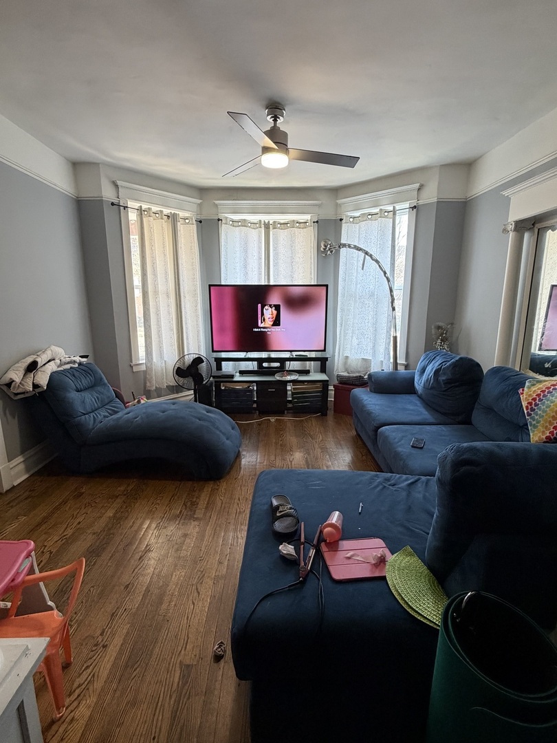6156 South Indiana Avenue Chicago, IL 60637 - Photo 3 of 21 a living room with furniture and a window