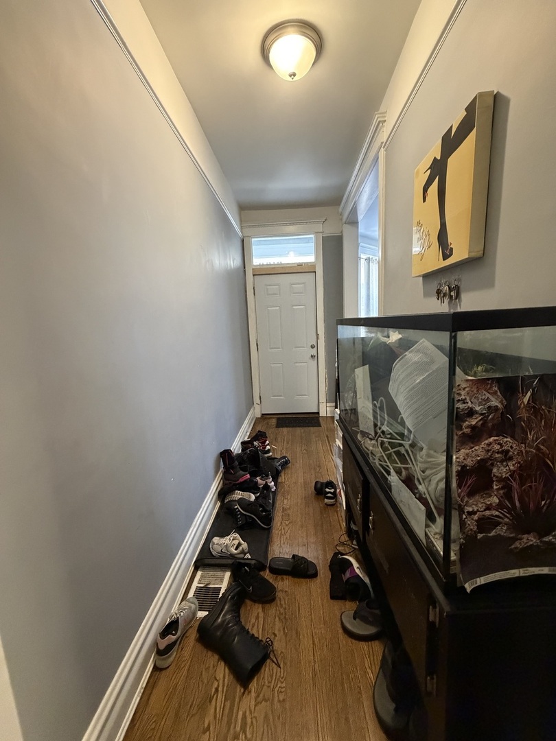 6156 South Indiana Avenue Chicago, IL 60637 - Photo 5 of 21 a room with gym equipment