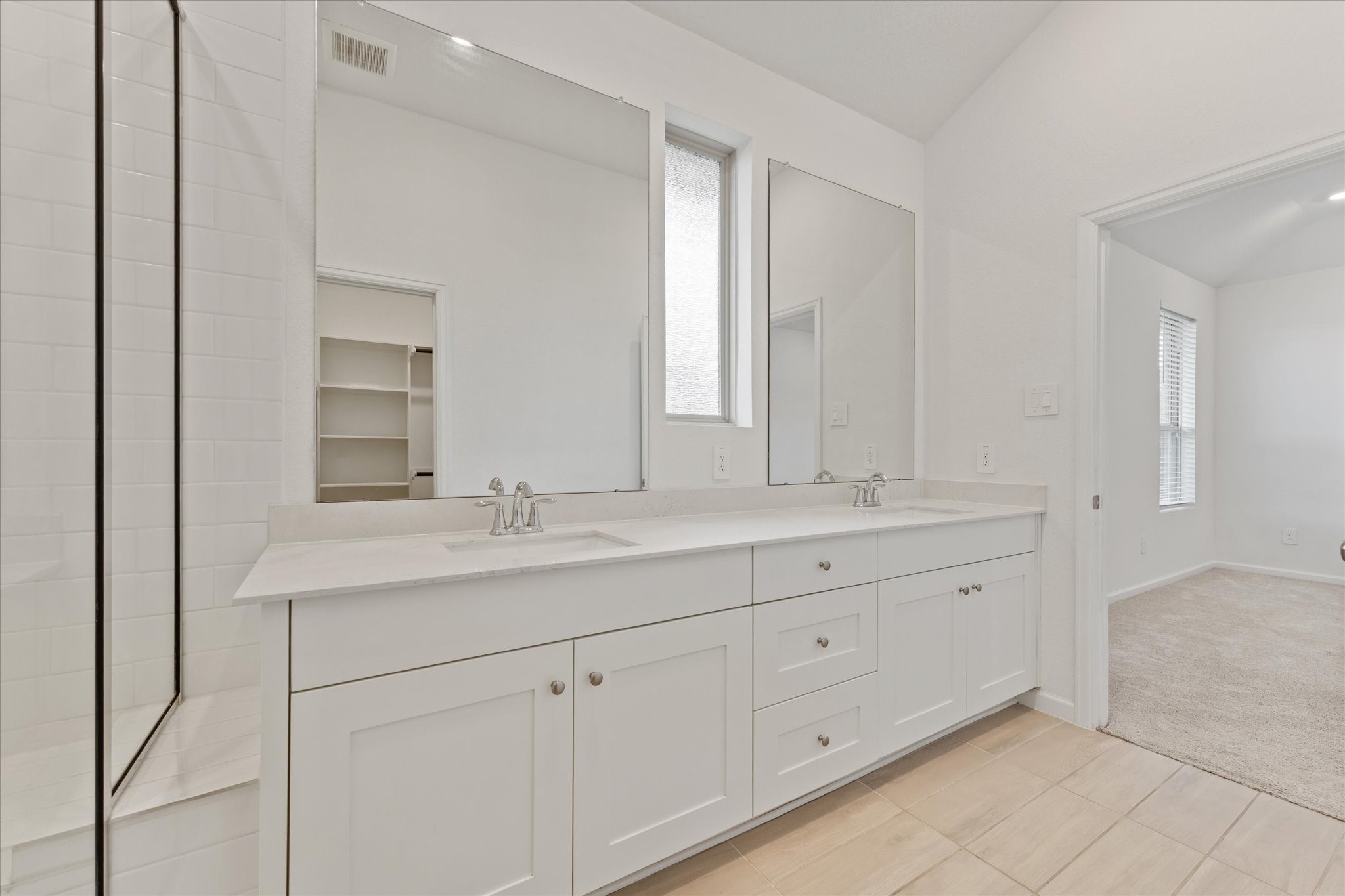 15520 Sunset Maple Court Conroe, TX 77302 - Photo 17 of 47 a bathroom with a granite countertop sink and a mirror