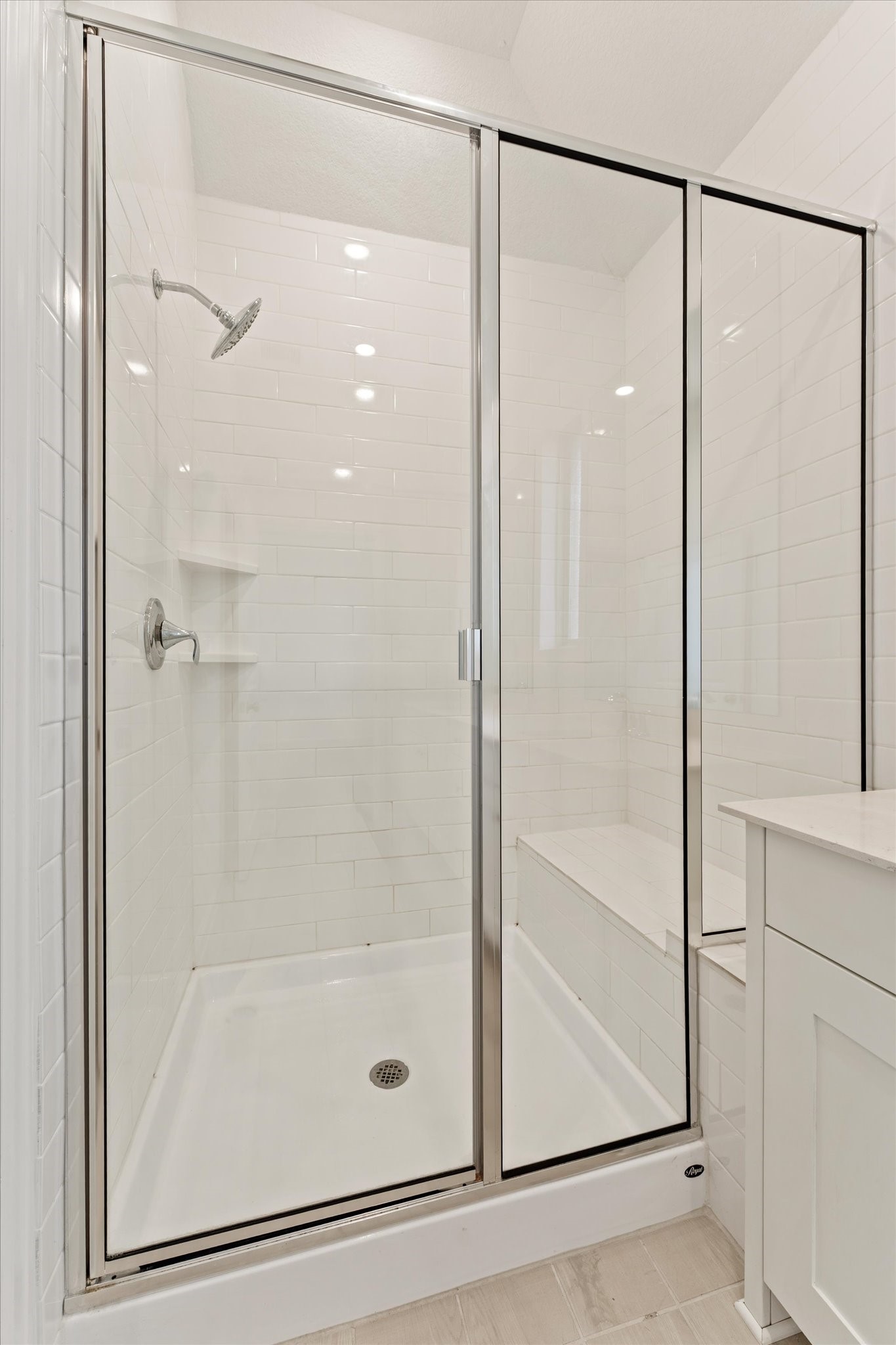 15520 Sunset Maple Court Conroe, TX 77302 - Photo 18 of 47 a bathroom with a glass shower door