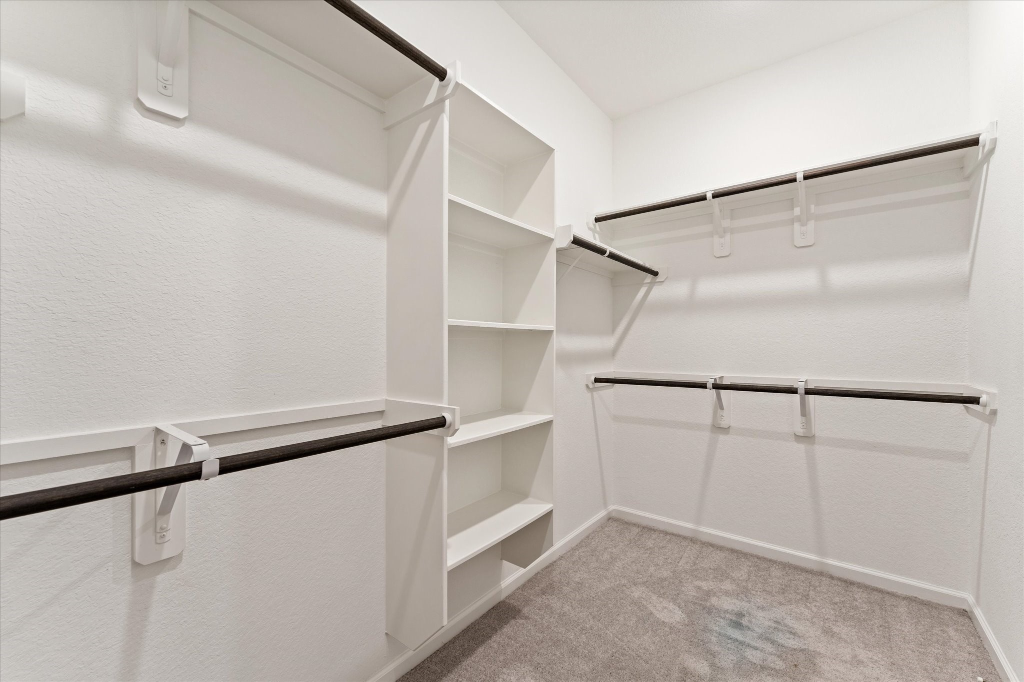 15520 Sunset Maple Court Conroe, TX 77302 - Photo 21 of 47 a view of an empty walk in closet