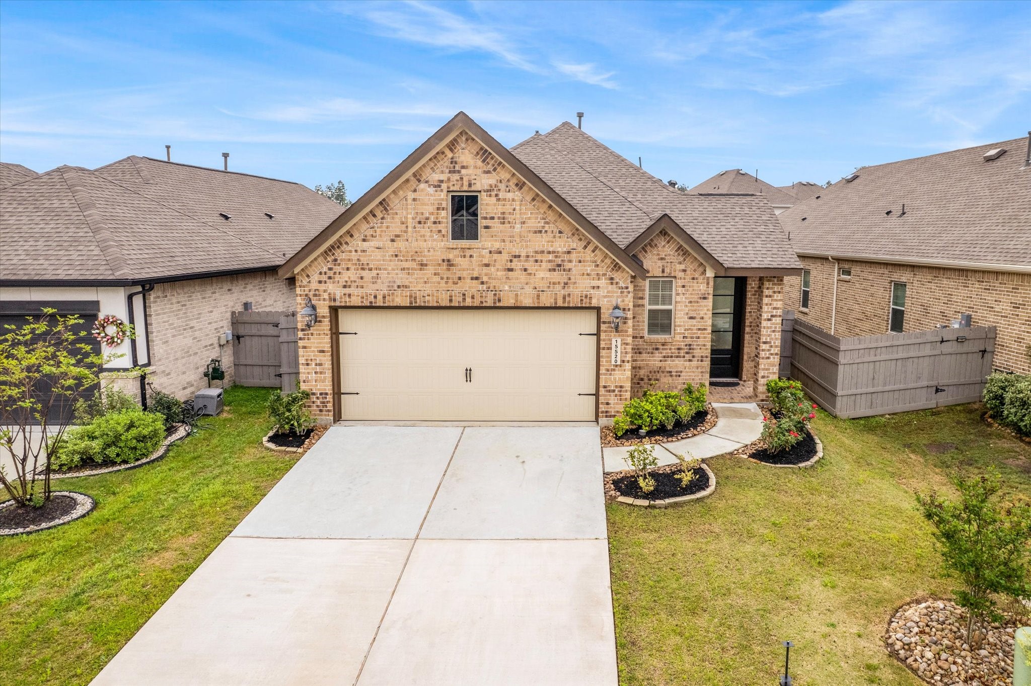 15520 Sunset Maple Court Conroe, TX 77302 - Photo 3 of 47 a view of a house with patio