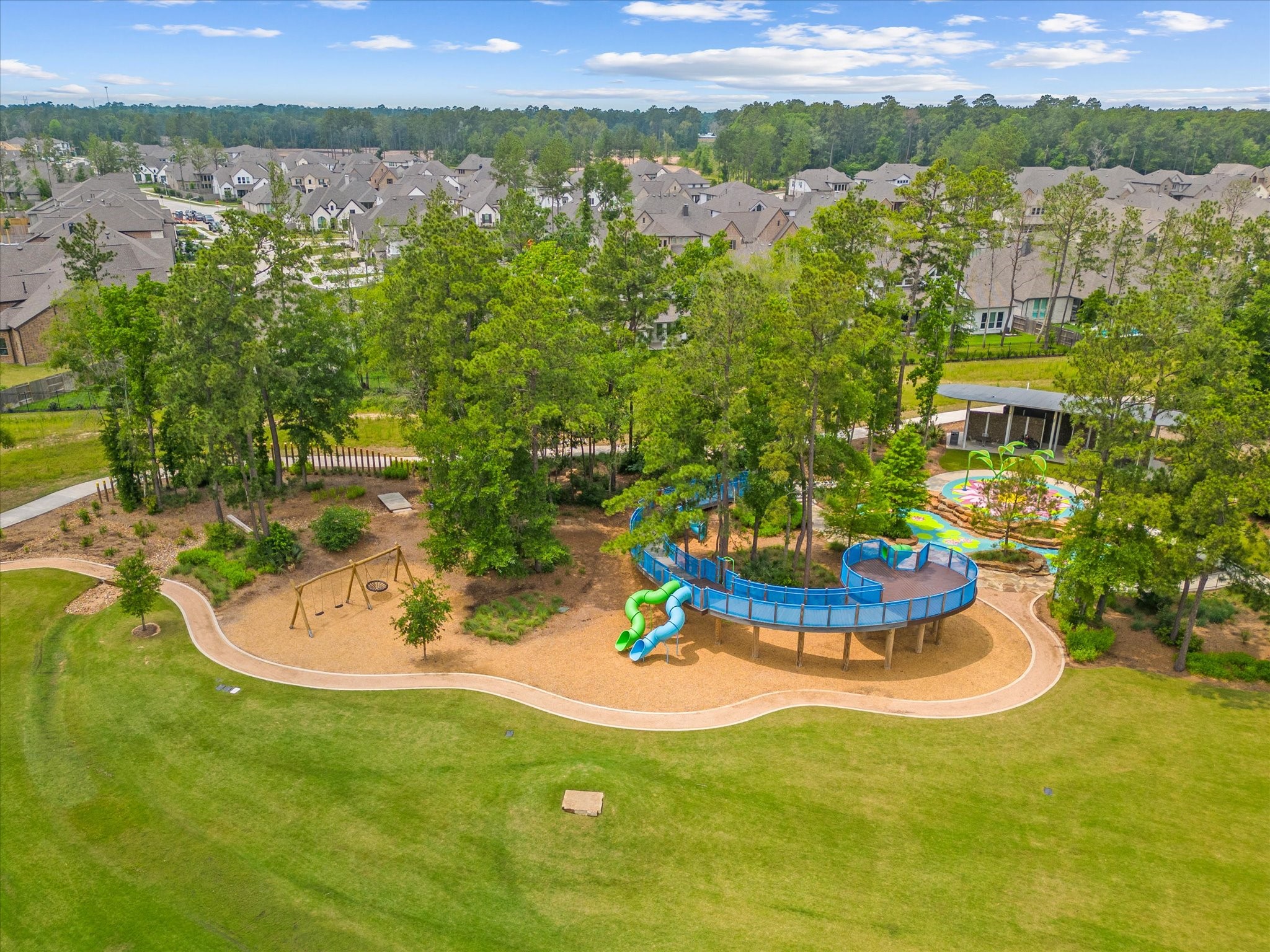 15520 Sunset Maple Court Conroe, TX 77302 - Photo 41 of 47 a view of a swimming pool with a yard