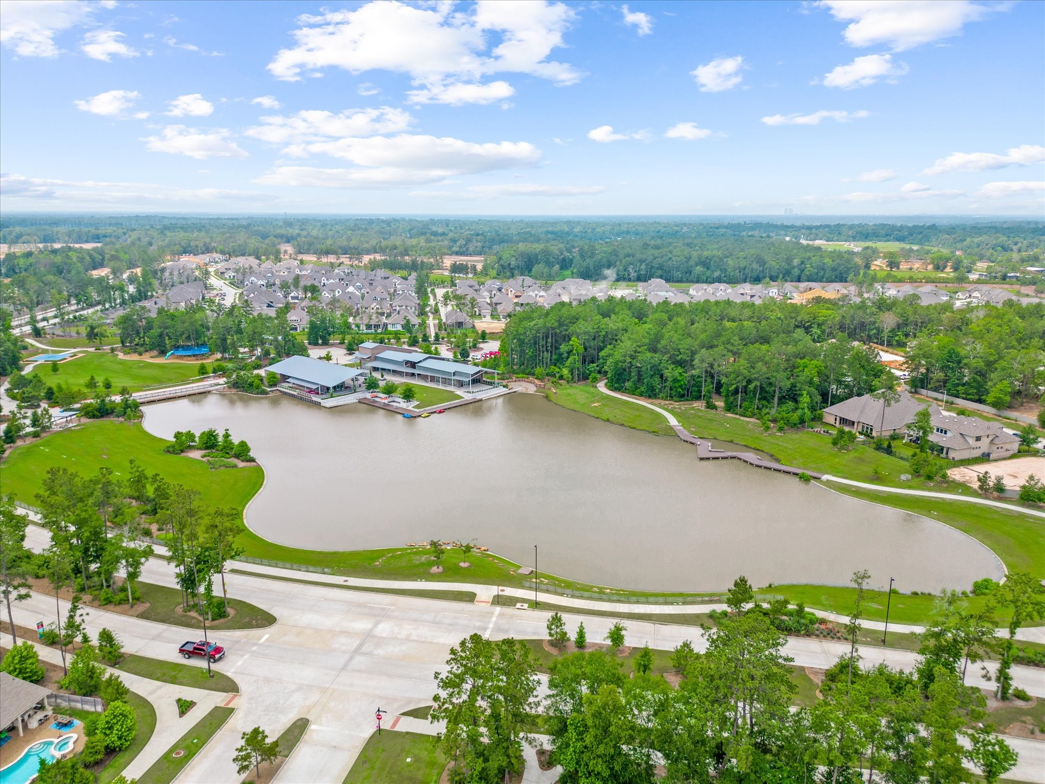 15520 Sunset Maple Court Conroe, TX 77302 - Photo 44 of 47 a view of a lake with outdoor space